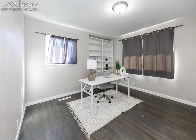 a living room with a couch and a table