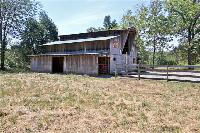 1214 Ben Collier Road Charlotte, TN 37036 - Photo 17 of 20 a view of a house with a yard