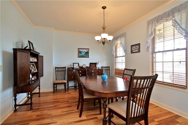 1214 Ben Collier Road Charlotte, TN 37036 - Photo 3 of 20 a view of a dining room with furniture window and wooden floor