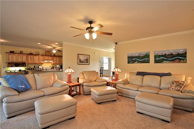 1214 Ben Collier Road Charlotte, TN 37036 - Photo 6 of 20 a living room with furniture kitchen view and a chandelier