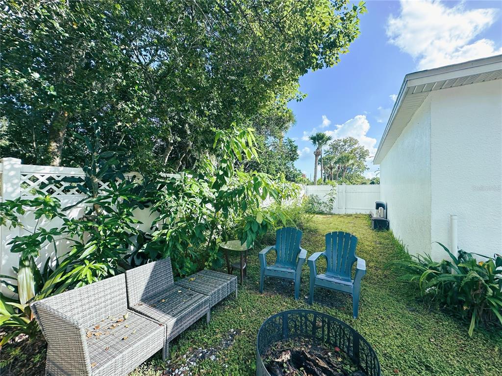 700 Castillo Place St. Cloud, FL 34769 - Photo 29 of 43 a view of yard with patio