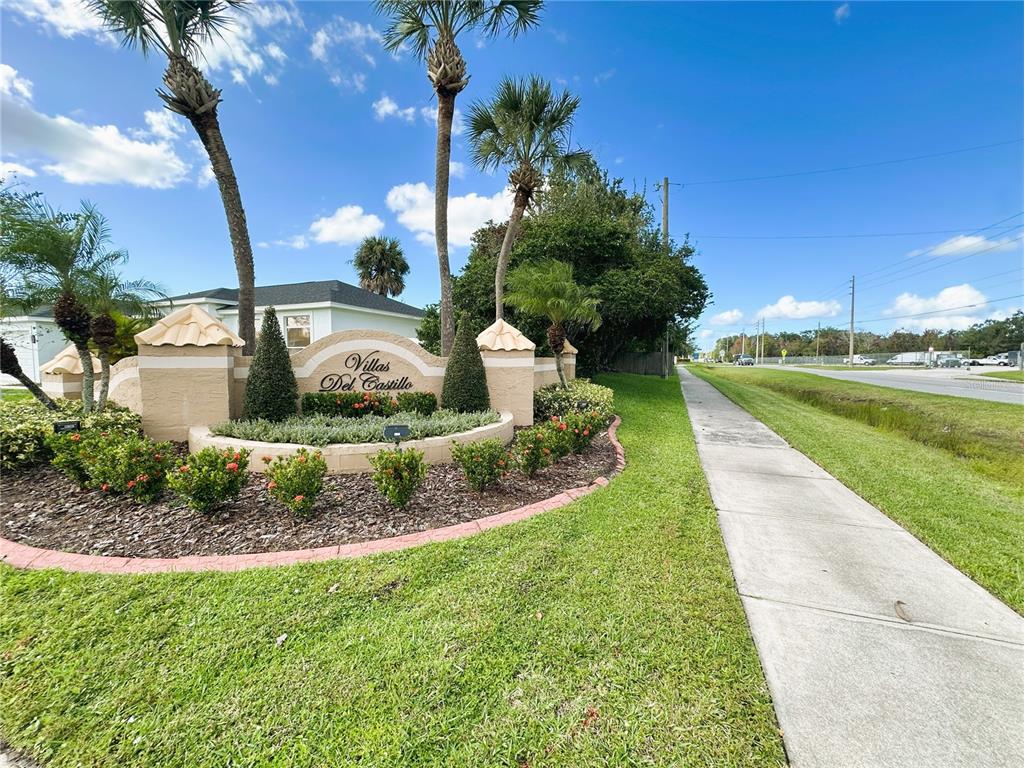 700 Castillo Place St. Cloud, FL 34769 - Photo 43 of 43 a view of a garden with houses