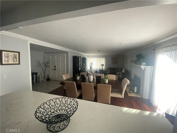 a living room with furniture a couch and a table