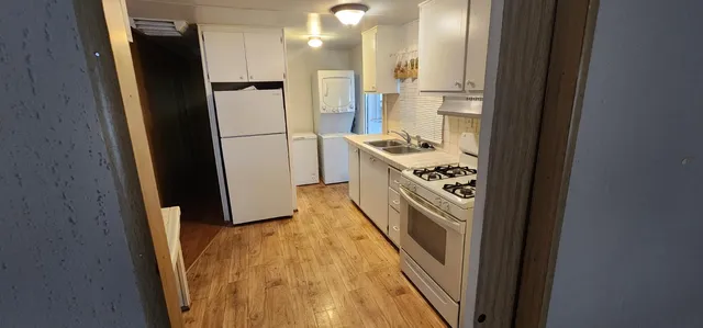 a view of a kitchen from a stove