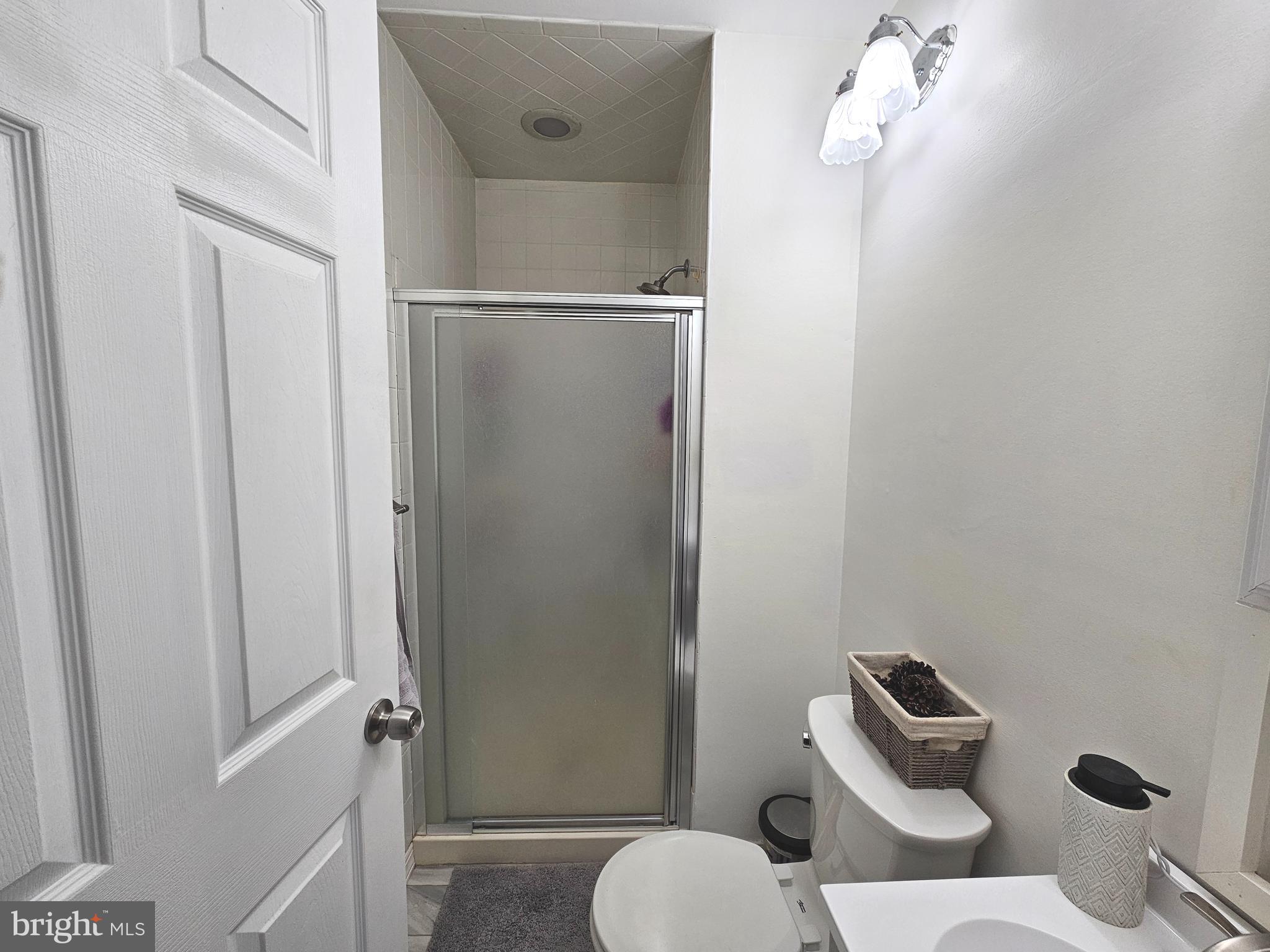 17 Exeter Court Bordentown, NJ 08505 - Photo 12 of 19 a bathroom with a toilet and a shower