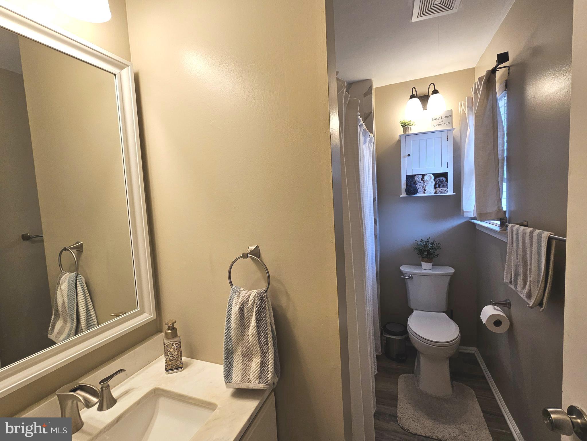 17 Exeter Court Bordentown, NJ 08505 - Photo 14 of 19 a bathroom with a sink and a mirror