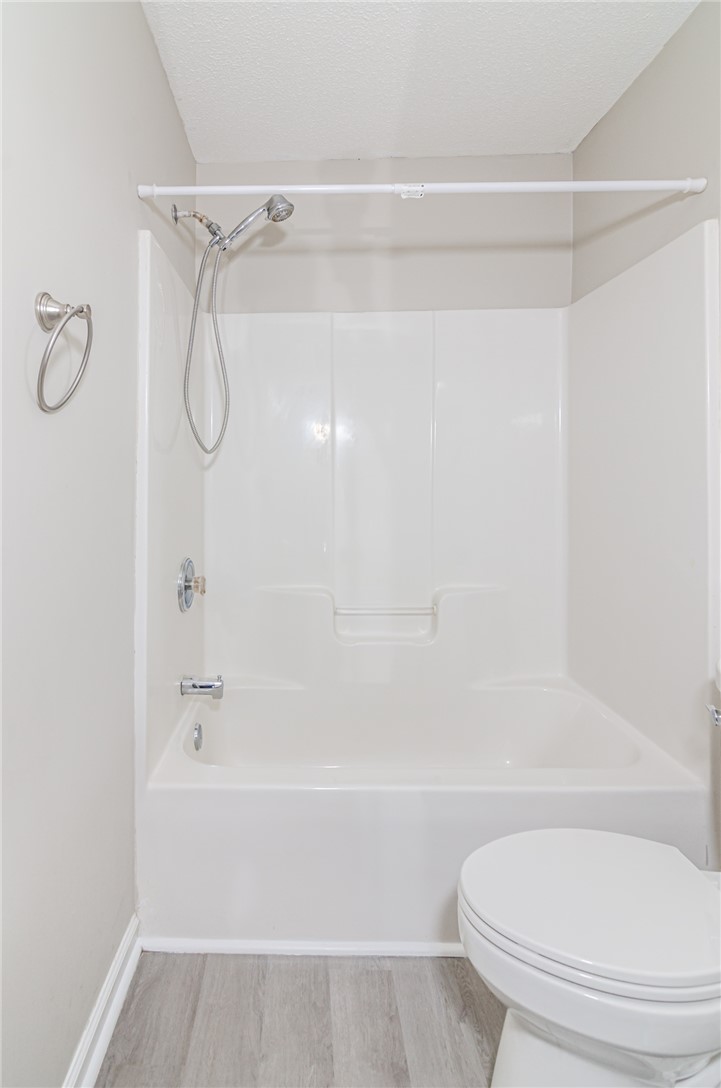 102 Hawk Ridge Drive Anderson, SC 29621 - Photo 14 of 38 This clean and functional bathroom features a shower and tub combination with durable flooring.