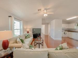 780 2nd Street Southwest Vero Beach, FL 32962 - Photo 1 of 21 a living room with furniture and a chandelier