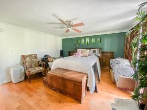 780 2nd Street Southwest Vero Beach, FL 32962 - Photo 11 of 21 a bed room with furniture and a window