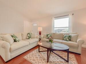 780 2nd Street Southwest Vero Beach, FL 32962 - Photo 14 of 21 a living room with furniture a rug and a window