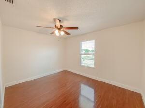 780 2nd Street Southwest Vero Beach, FL 32962 - Photo 20 of 21 an empty room with a window and a fan