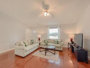780 2nd Street Southwest Vero Beach, FL 32962 - Photo 2 of 21 a living room with furniture and a flat screen tv