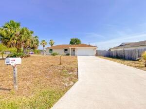 780 2nd Street Southwest Vero Beach, FL 32962 - Photo 7 of 21 a view of a house with a yard