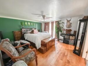 780 2nd Street Southwest Vero Beach, FL 32962 - Photo 10 of 21 a bed room with furniture and a window