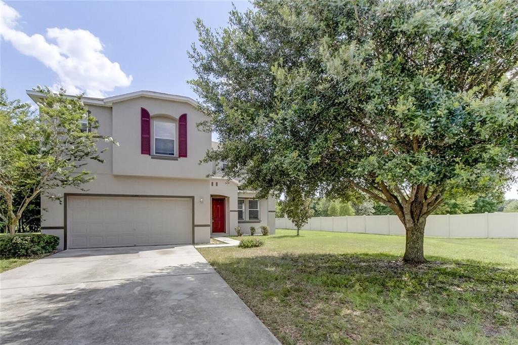 11148 Rising Mist Boulevard Riverview, FL 33578 - Photo 1 of 1 a front view of a house with a yard