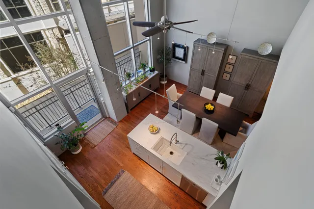 a view of living room with furniture and floor to ceiling window