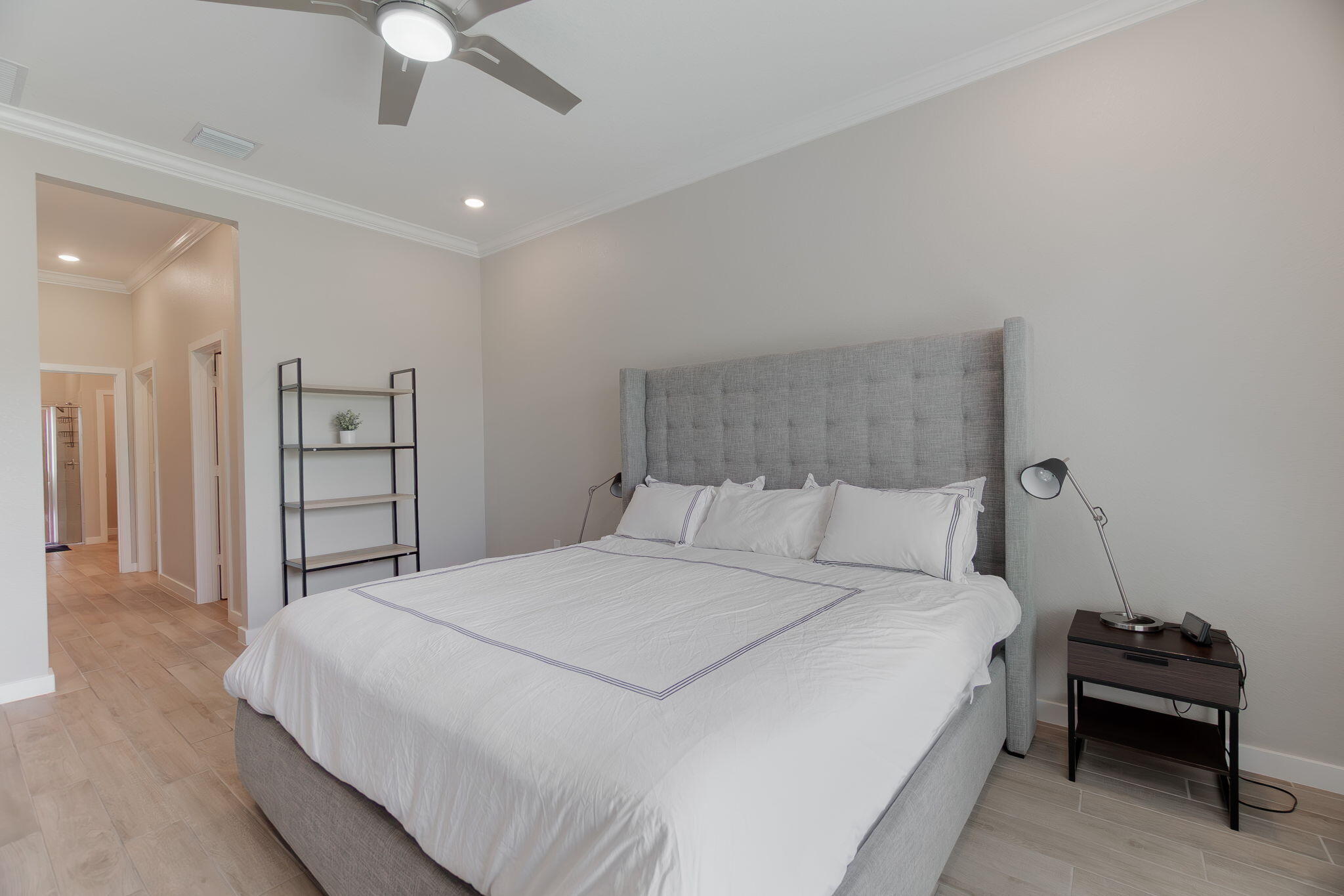 19546 Weathervane Way Loxahatchee, FL 33470 - Photo 25 of 63 a bedroom with a bed and a couch