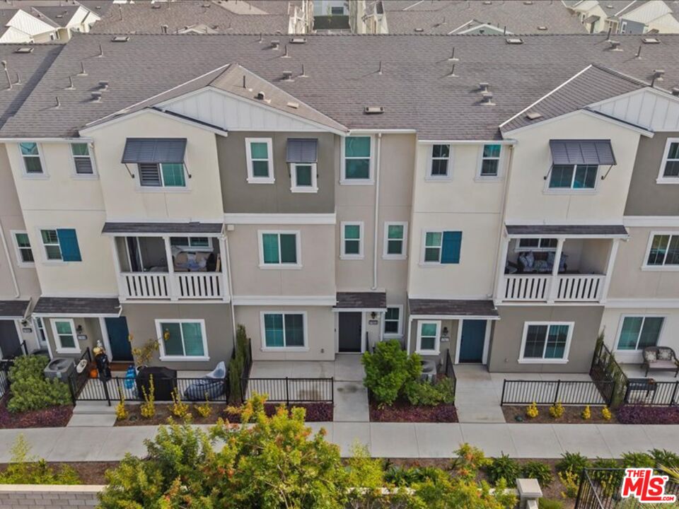 17923 Goodyear Carson, CA 90746 - Photo 3 of 17 a front view of a building with garden and entryway