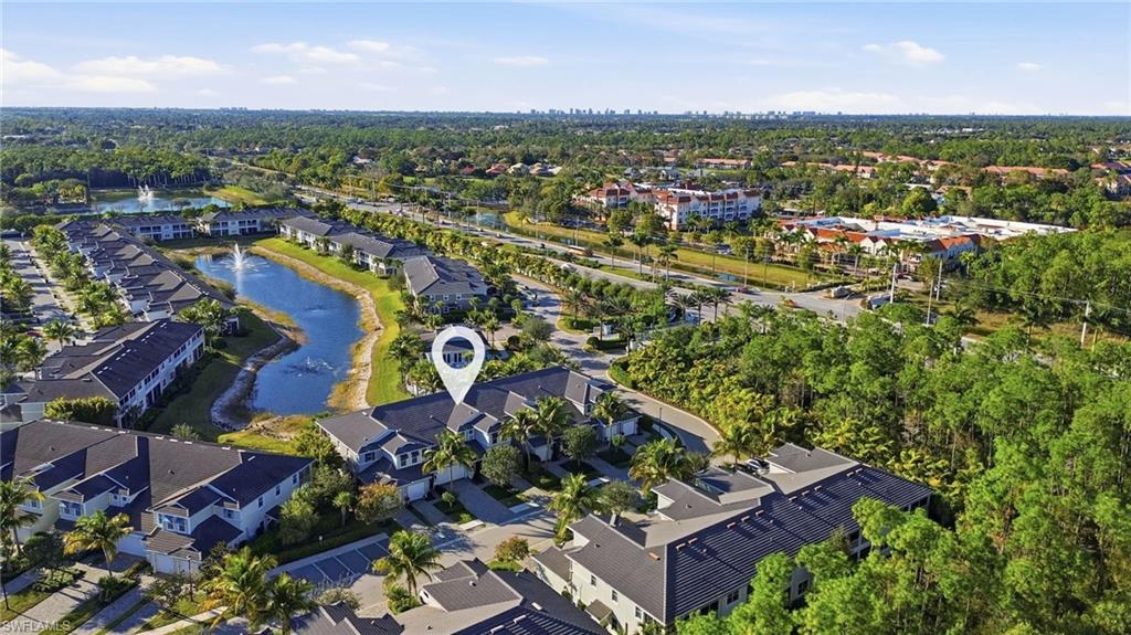 6980 Avalon Circle, Unit 1102 Naples, FL 34112 - Photo 19 of 24 Aerial overview of property's location featuring a large body of water
