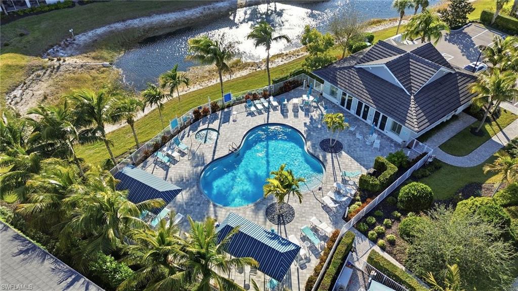 6980 Avalon Circle, Unit 1102 Naples, FL 34112 - Photo 20 of 24 Aerial view of a nearby body of water and a pool