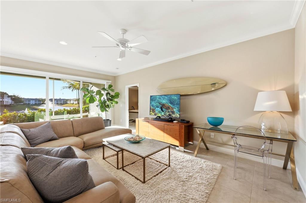6980 Avalon Circle, Unit 1102 Naples, FL 34112 - Photo 4 of 24 Tiled living room featuring ornamental molding, a ceiling fan, and recessed lighting