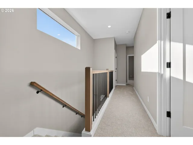 a view of hallway with stairs