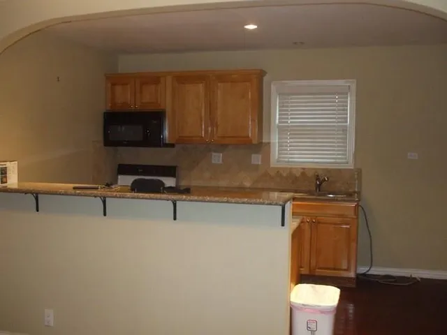 a bathroom with a toilet a sink and a bathtub