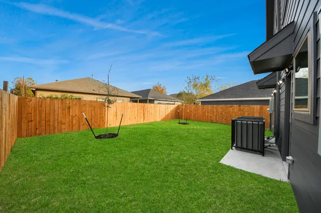 a view of a backyard with tv