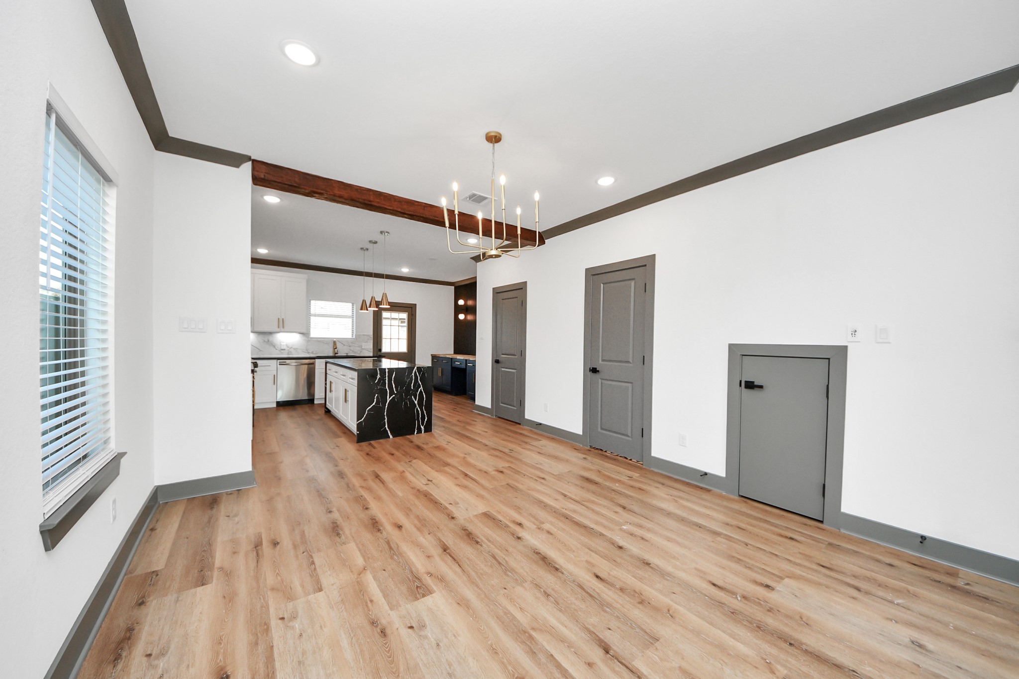 7925 Ritz Street, Unit B Houston, TX 77028 - Photo 9 of 35 a view of a kitchen with a sink and a refrigerator