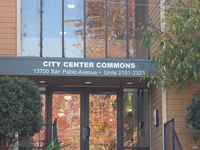 a view of a sign board with a street