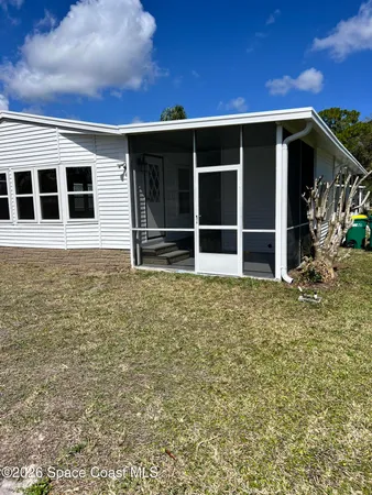 a view of an house with backyard space