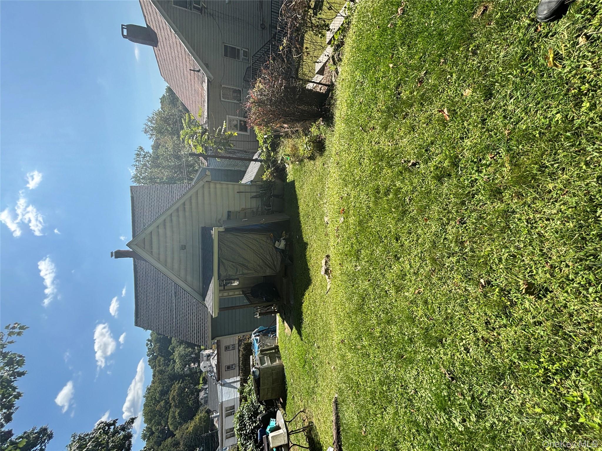 1340 Main Street Peekskill, NY 10566 - Photo 13 of 24 a view of a back yard of the house
