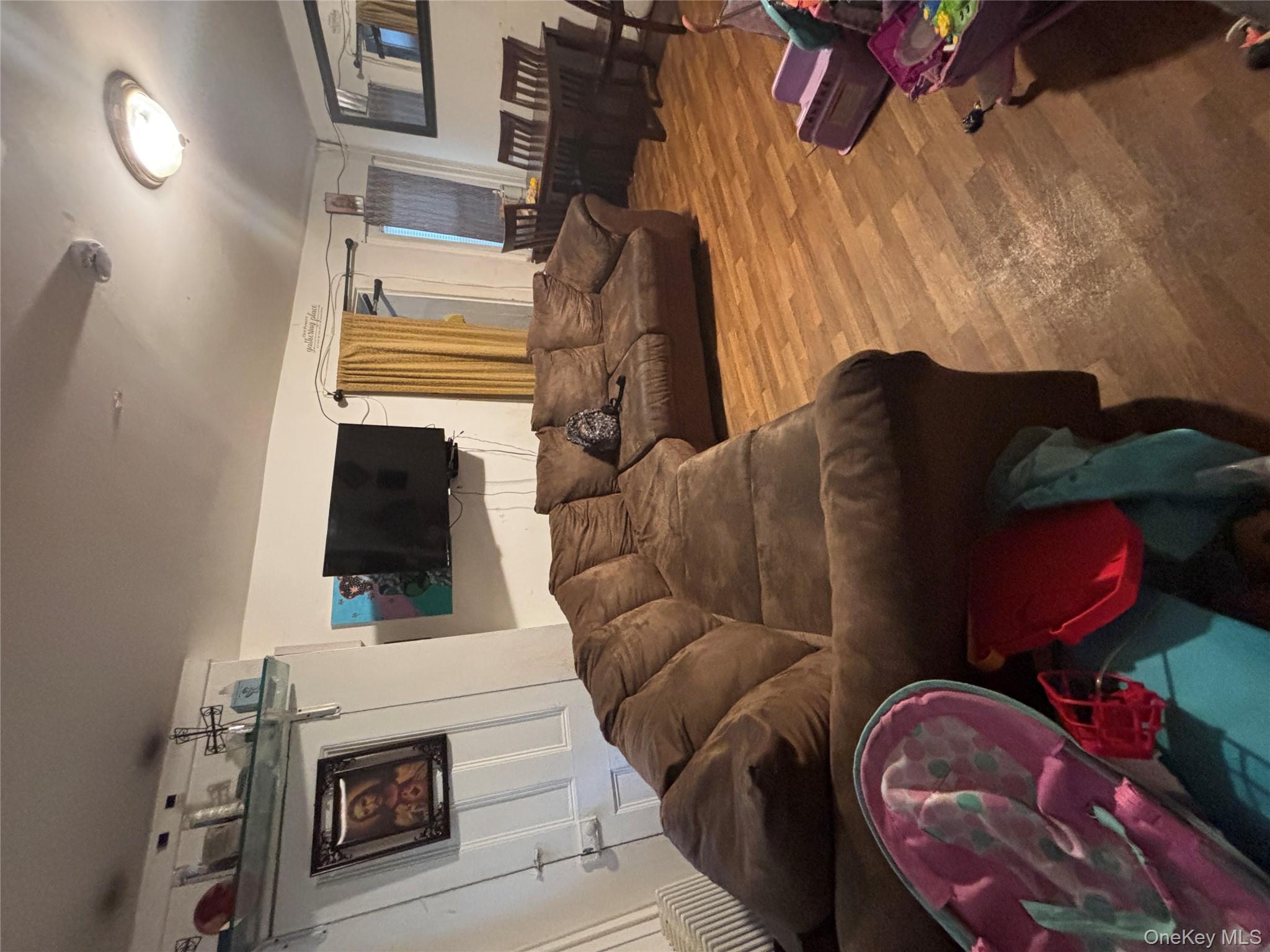 1340 Main Street Peekskill, NY 10566 - Photo 17 of 24 a living room with furniture and a flat screen tv