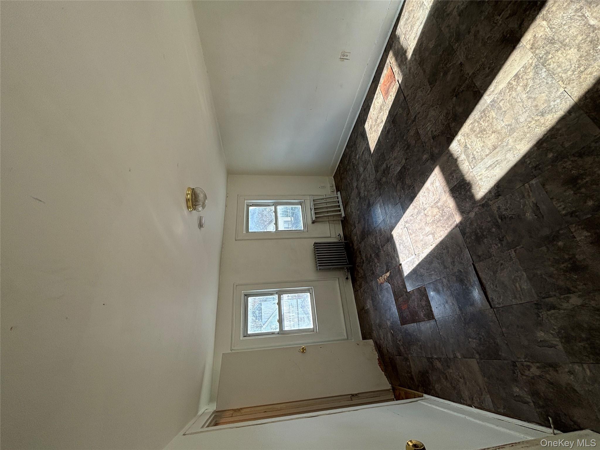 1340 Main Street Peekskill, NY 10566 - Photo 8 of 24 a view of wooden floor and windows in a room