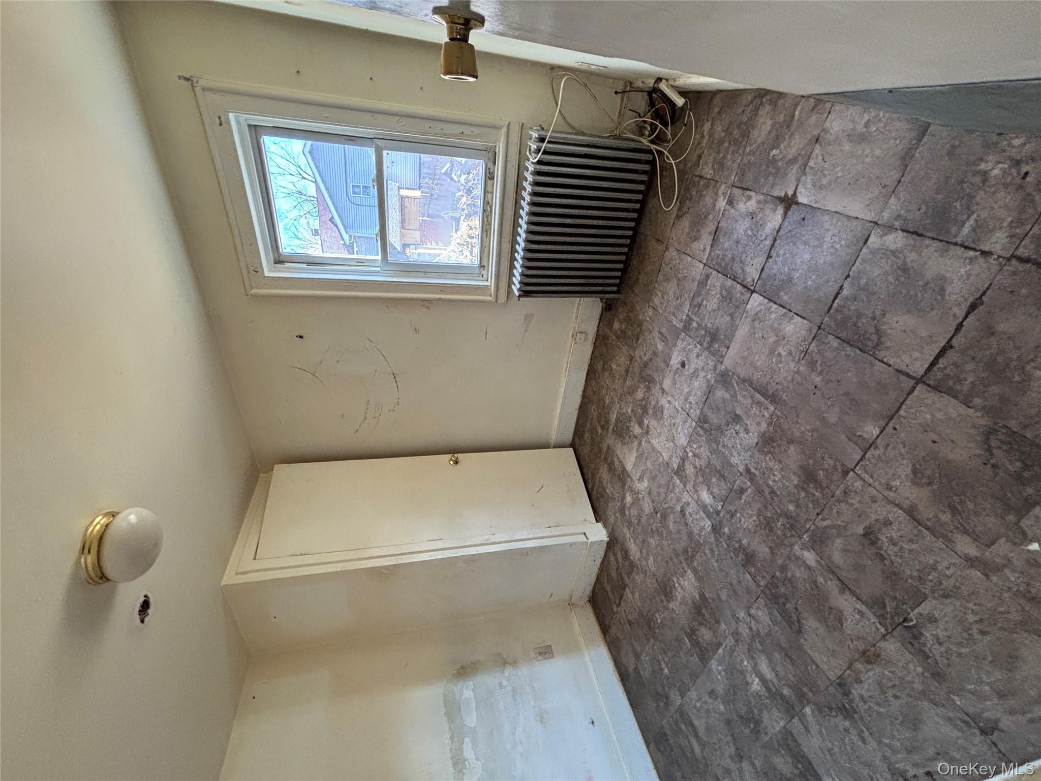 1340 Main Street Peekskill, NY 10566 - Photo 9 of 24 a view of an empty room with a window