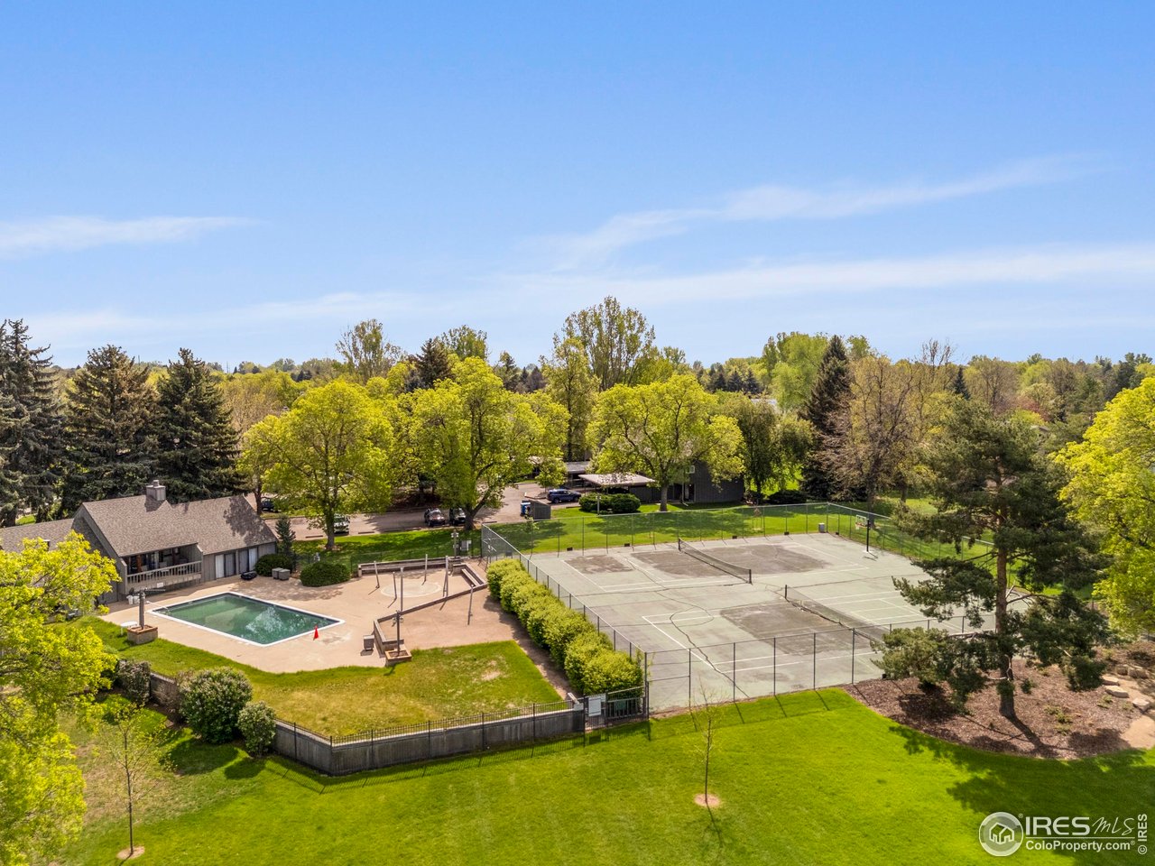 705 East Drake Road, Unit 35 Fort Collins, CO 80525 - Photo 31 of 34 a view of a swimming pool with a yard