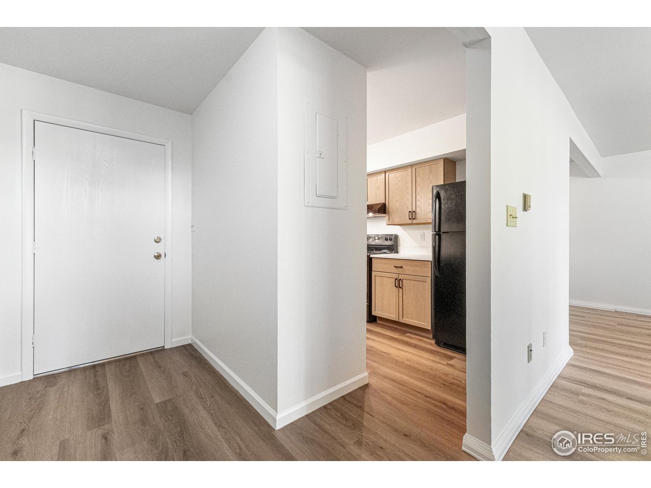 705 East Drake Road, Unit 35 Fort Collins, CO 80525 - Photo 6 of 34 a view of kitchen with wooden floor