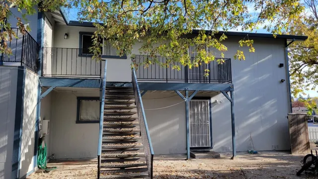a view of entryway with wooden stairs