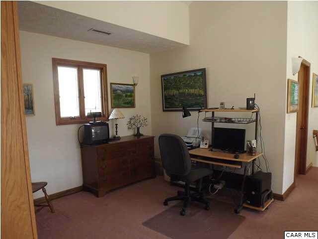 61 Dogleg Road Palmyra, VA 22963 - Photo 18 of 39 a view of a workspace with furniture and a window