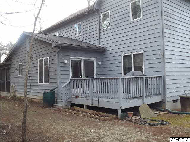 61 Dogleg Road Palmyra, VA 22963 - Photo 3 of 39 a view of a house with a yard and deck