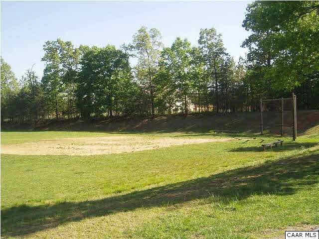 61 Dogleg Road Palmyra, VA 22963 - Photo 35 of 39 a view of a swimming pool with an outdoor space and seating area