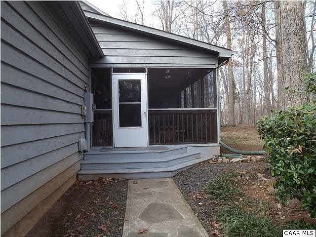 61 Dogleg Road Palmyra, VA 22963 - Photo 4 of 39 a view of house with backyard and wooden floor