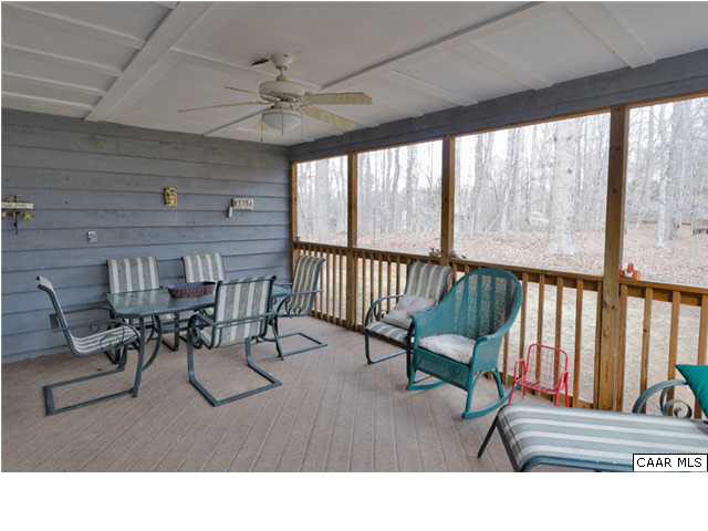 61 Dogleg Road Palmyra, VA 22963 - Photo 5 of 39 a living room with furniture and a large window