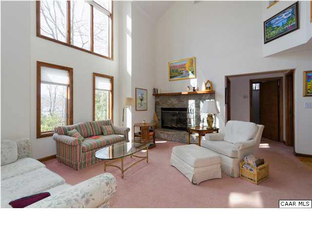 61 Dogleg Road Palmyra, VA 22963 - Photo 9 of 39 a living room with furniture and a fireplace