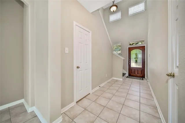 a view of an entryway with wooden floor
