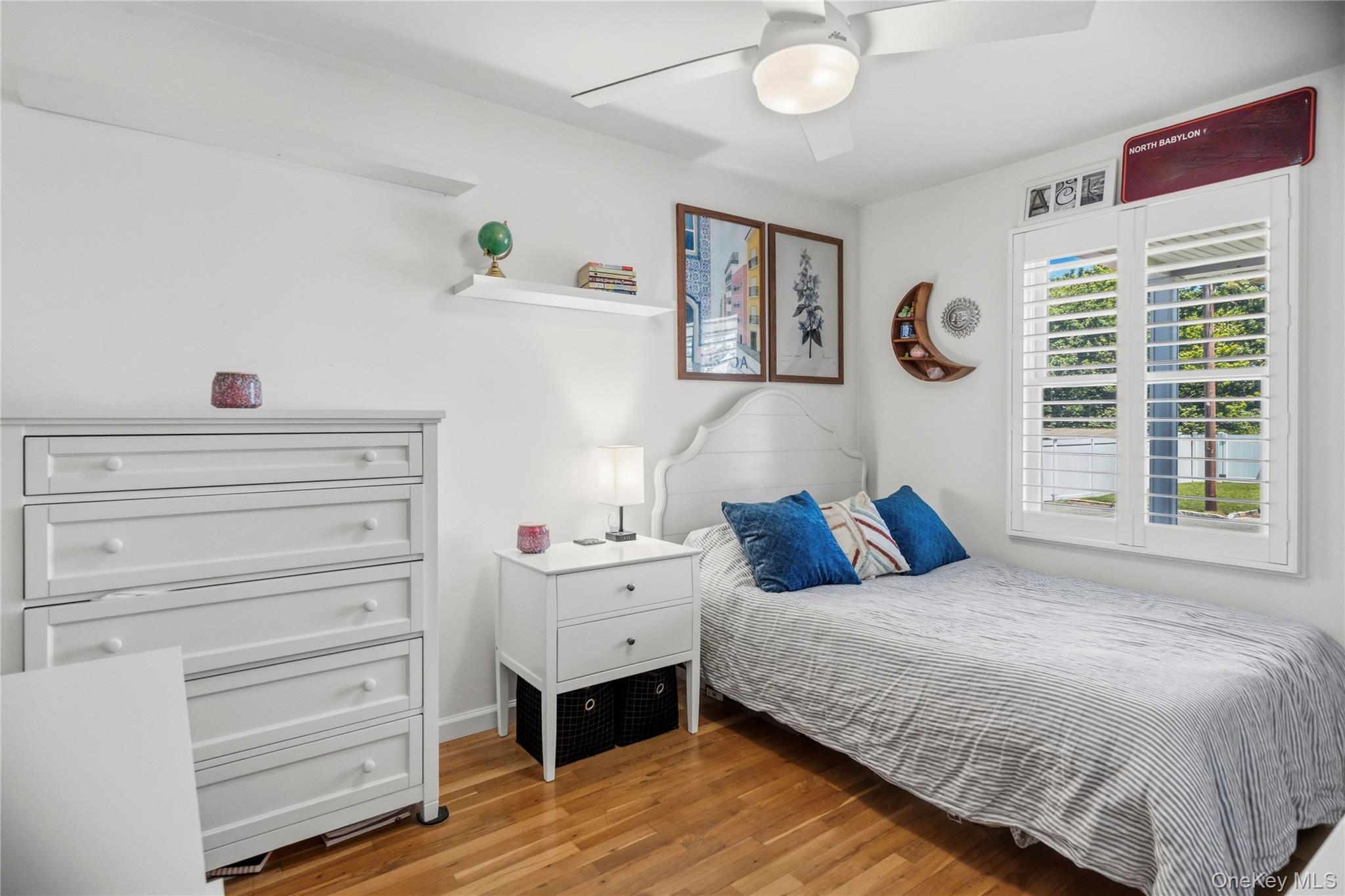 190 Sexton Road West Babylon, NY 11704 - Photo 19 of 28 a bedroom with a bed and a window