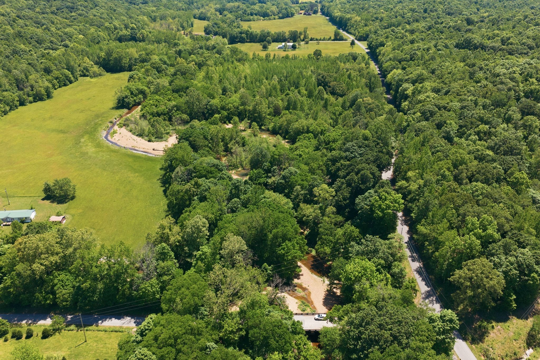 1490 Upper Standing Rock Road Dover, TN 37058 - Photo 4 of 26 an aerial view of a house with a yard
