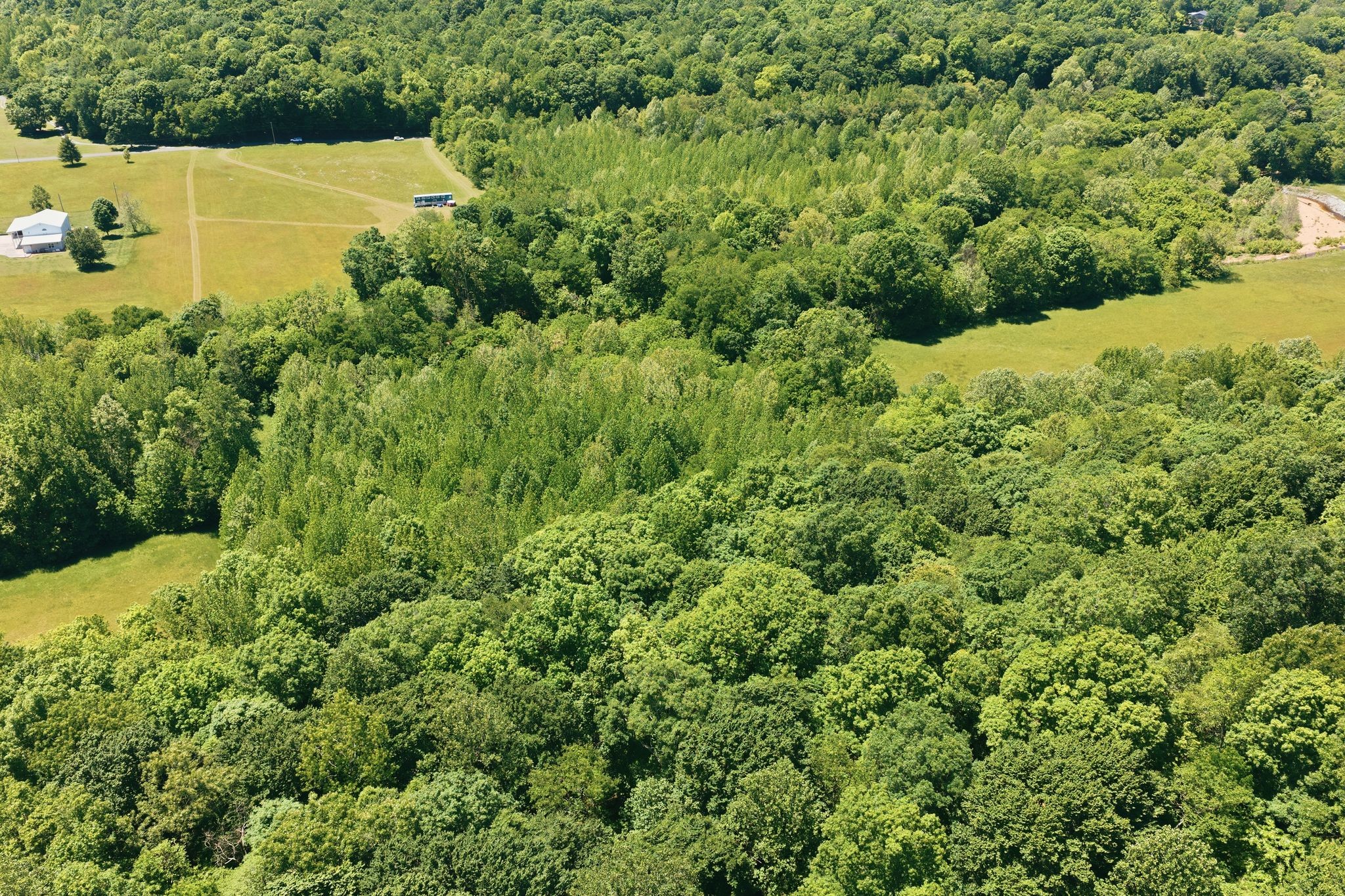 1490 Upper Standing Rock Road Dover, TN 37058 - Photo 8 of 26 an aerial view of a house with a yard