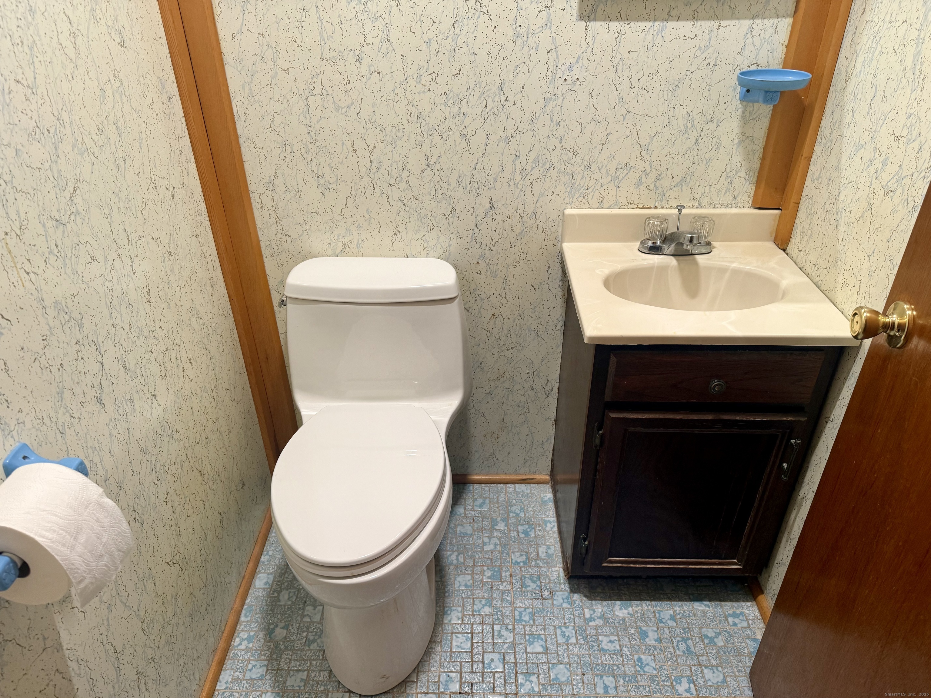 16 Naugatuck Avenue Shelton, CT 06484 - Photo 16 of 36 a bathroom with a sink and a toilet