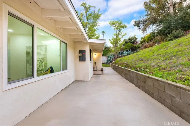 a view of a balcony with mountain view